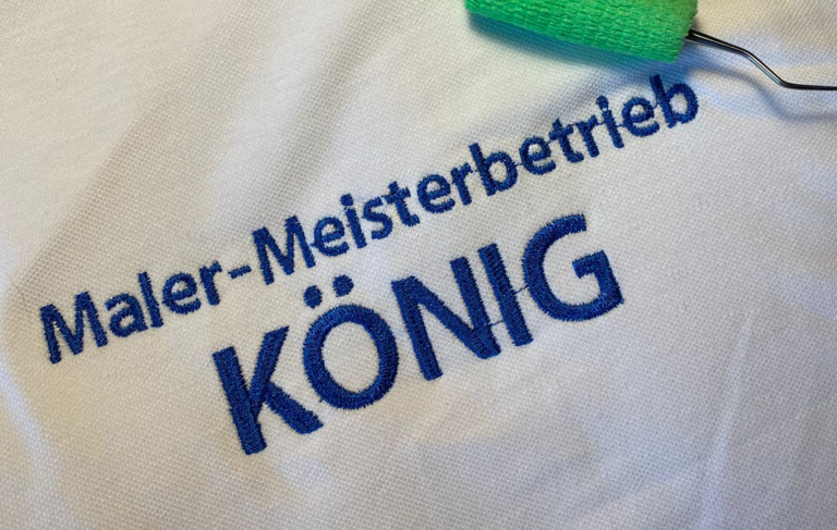 Malermeister König Polo Shirt Rückenansicht mit individuellem Stick des Firmennamens.